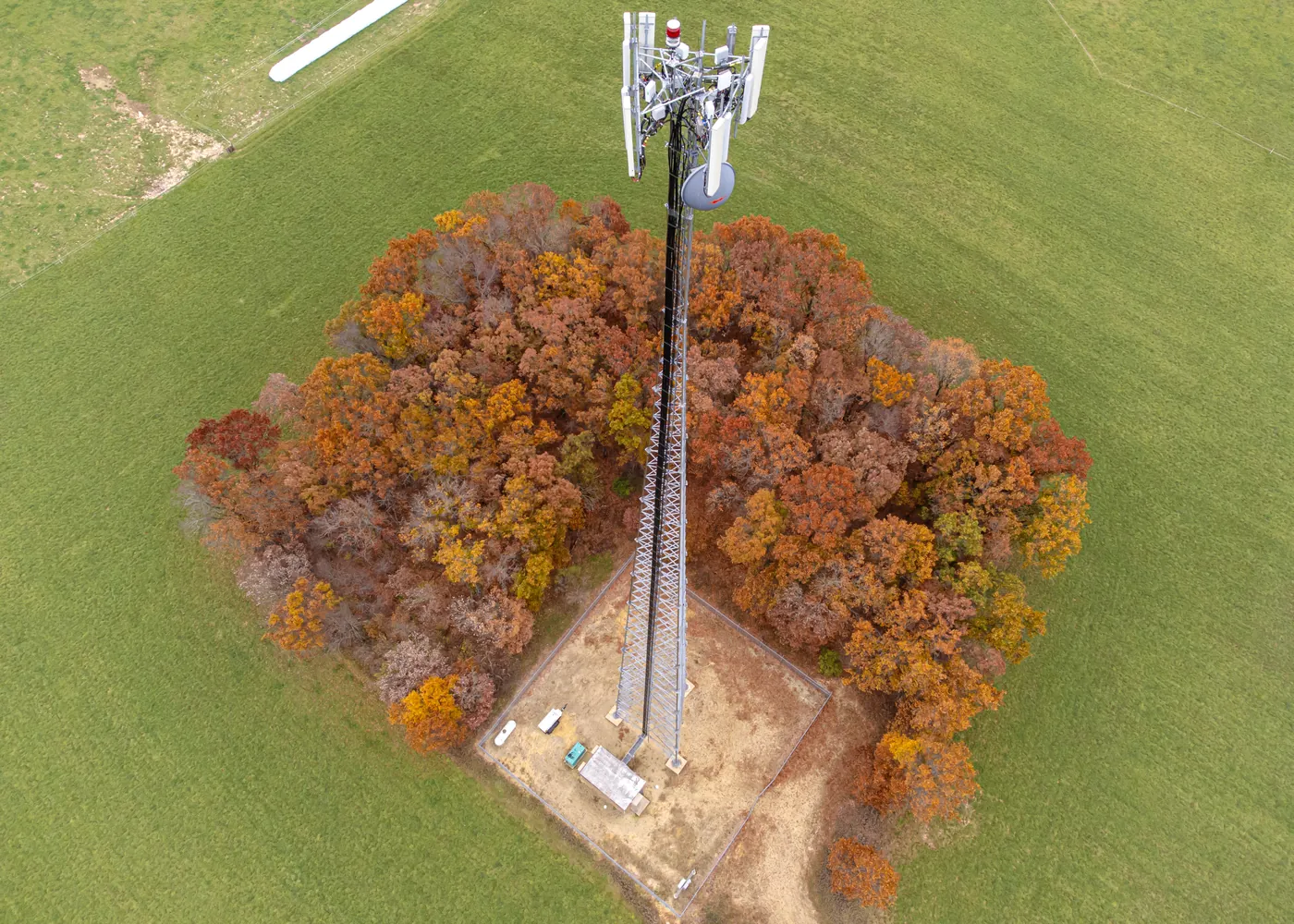 Telecommunications mast site